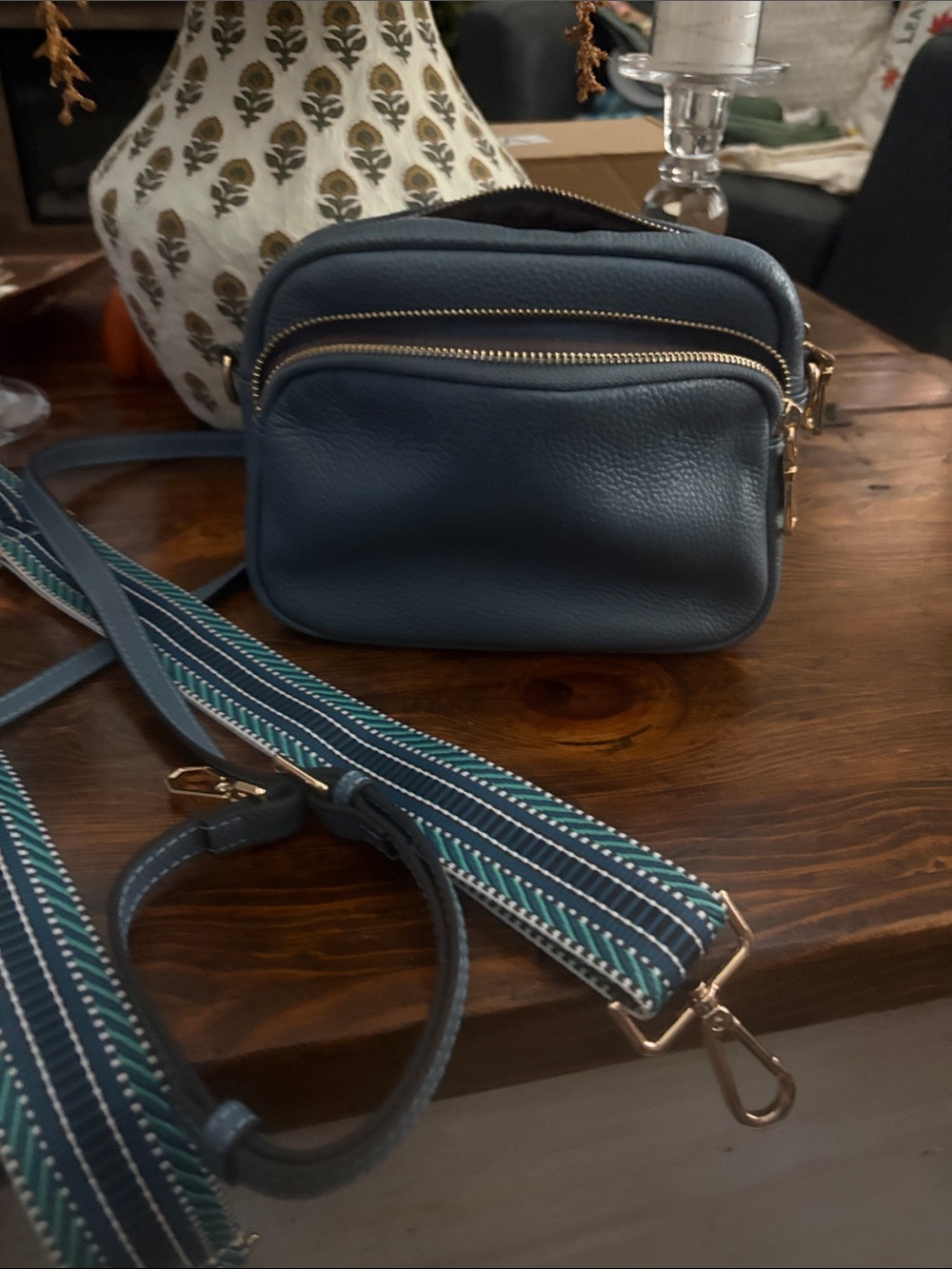 Compact Blue Leather Crossbody Bag with Striped Adjustable Strap